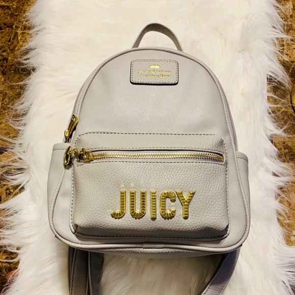 This is a Juicy Couture Bag it is a mini book bag - Picture 1 of 1